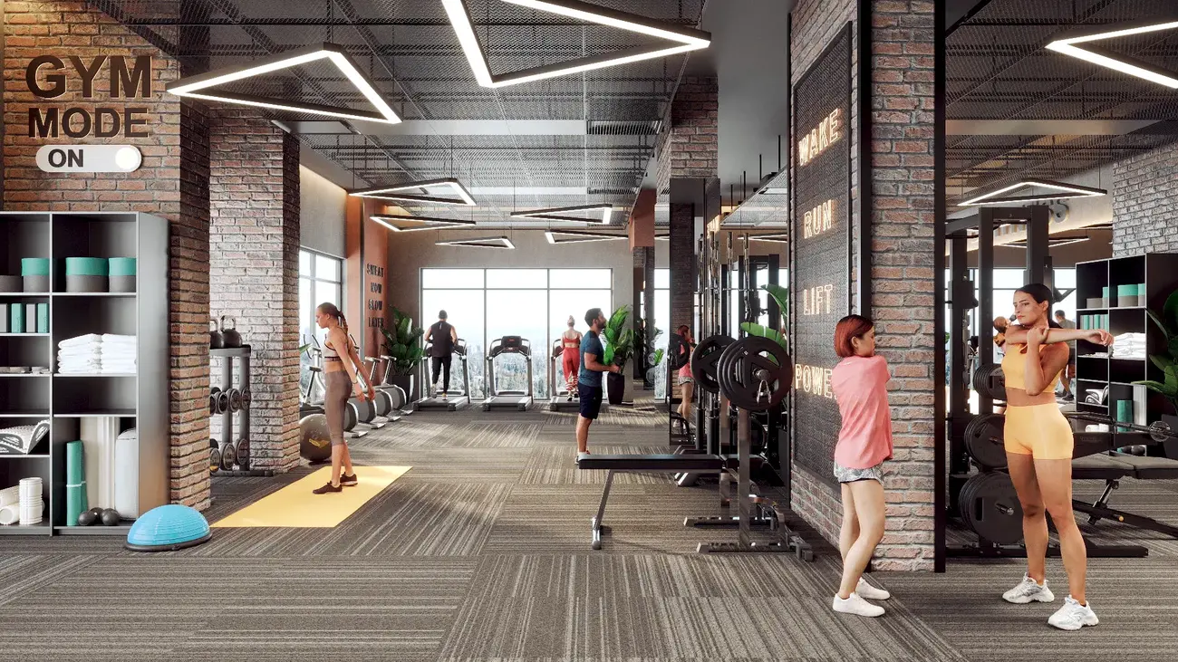 Phòng gym hiện đại tại dự án Bcons New Sky với thiết bị Technogym và dịch vụ PT tại chỗ.